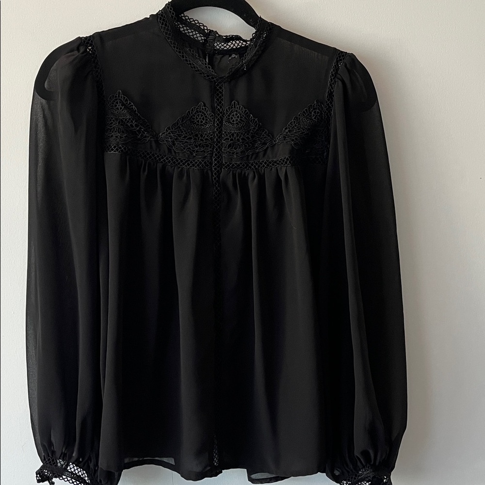Vero Moda Stylish Black Sheer Lace Blouse
Size: Small
Perfect used state.